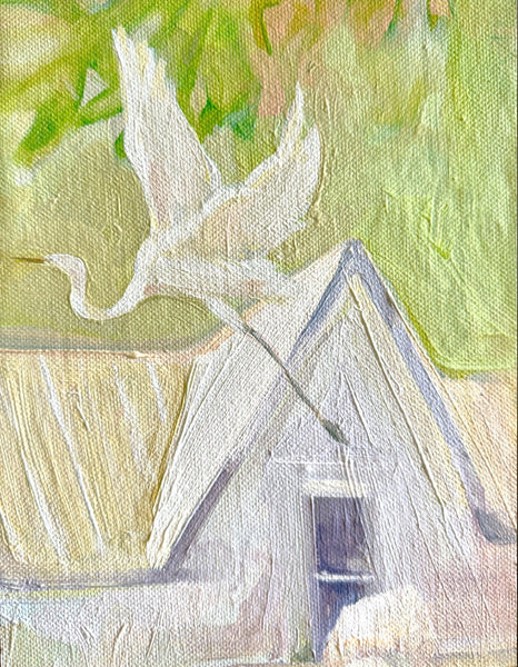 Framed oil painting with a white bird flying over a rooftop and green background